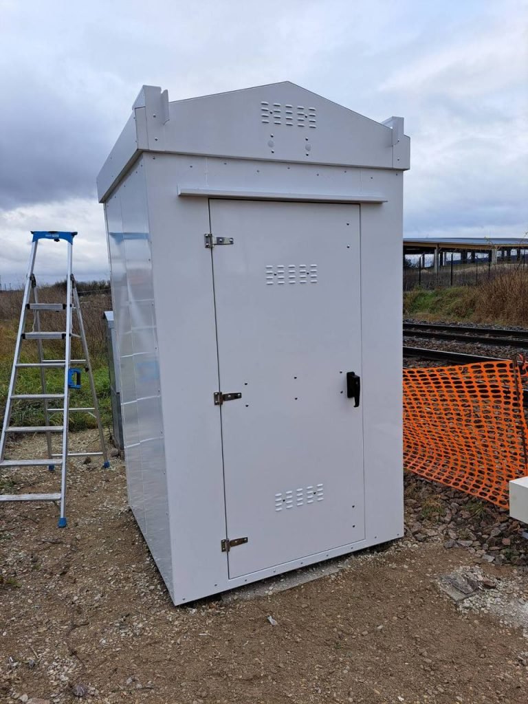 Completed SafeBox RT enclosure in service beside the running line