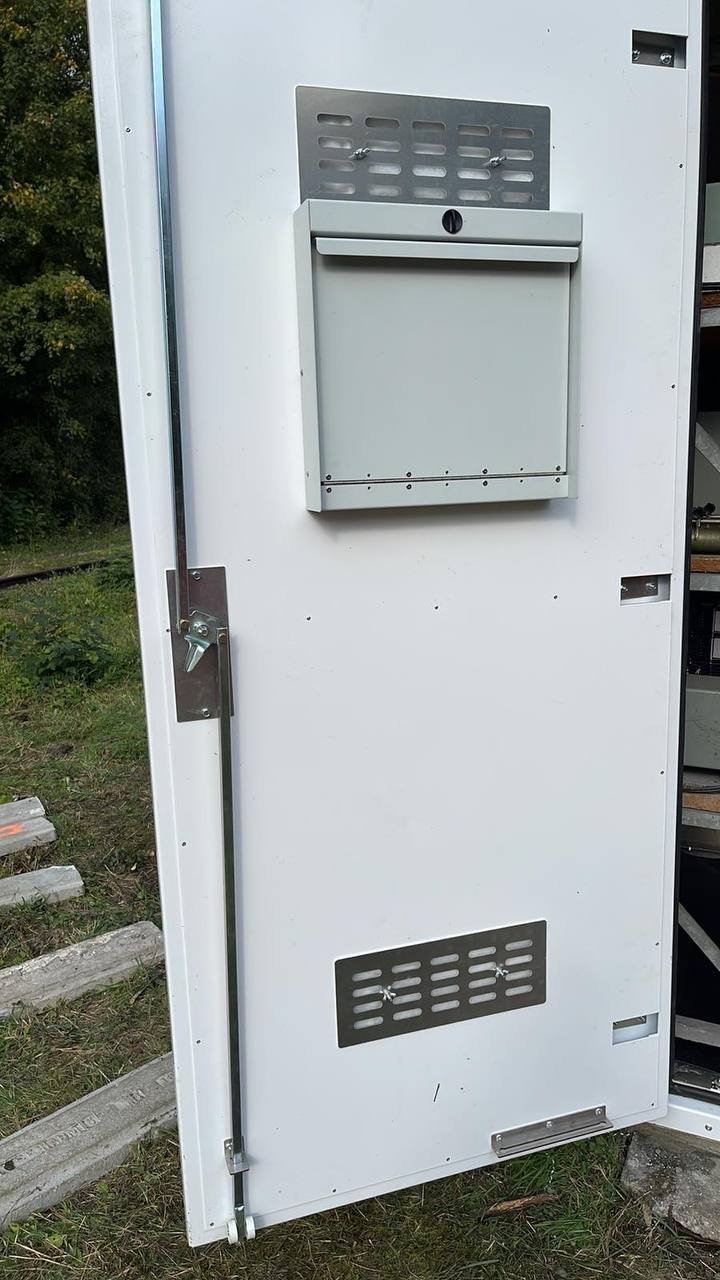 Open SafeBox RT door showing filtered vents and internal locking bar